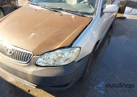 2003 Toyota Corolla Le z USA, uszkodzony, nr VIN JTDBR32E832005254